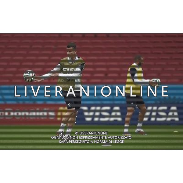 (140614) -- PORTO ALEGRE, June 14, 2014 () -- France\'s Karim Benzema (R) and Laurent Koscielny attend a training session in Porto Alegre, Brazil, June 14, 2014. (/Li Ga)(rh) ©PHOTOSHOT/Agenzia Aldo Liverani sas - ITALY ONLY - EDITORIAL USE ONLY - Allenamento dei giocatori della nazionale della francia a Porto Alegre, in Brasile, 14 giugno, 2014