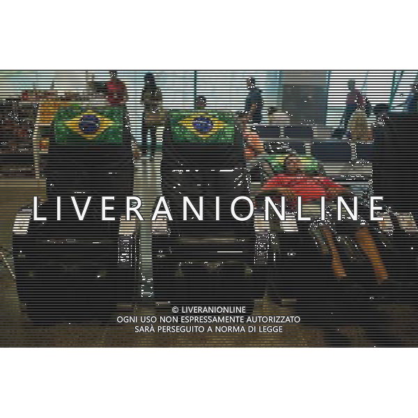 (140614) -- SALVADOR, June 14, 2014 () -- A tourist rests at the Luis Eduardo Magalhaes International Airport, during the World Cup 2014, in Salvador, Brazil, on June 14, 2014. (/Jhon Paz) (rh) ©PHOTOSHOT/Agenzia Aldo Liverani sas - ITALY ONLY - EDITORIAL USE ONLY - Il Brasile ospita la coppa del mondo FIFA World Cup 2014
