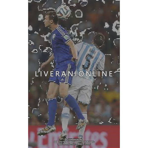 (140615) -- RIO DE JANEIRO, June 15, 2014 () -- Argentina\'s Fernando Gago competes for a header wiith Bosnia and Herzegovina\'s Edin Dzeko during a Group F match between Argentina and Bosnia and Herzegovina of 2014 FIFA World Cup at the Estadio de Maracana Stadium in Rio de Janeiro, Brazil, June 15, 2014. (/Wang Lili) ©photoshot/Agenzia Aldo Liverani sas - ITALY ONLY - Argentina - Bosnia Erzegovina partita del Gruppo F Coppa del Mondo 2014 FIFA World Cup allo Stadio Maracana\' Stadium di Rio de Janeiro, in Brasile, 15 giugno 2014