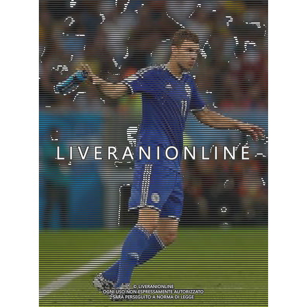 (140615) -- RIO DE JANEIRO, June 15, 2014 () -- Bosnia and Herzegovina\'s Edin Dzeko reacts after drinking water during a Group F match between Argentina and Bosnia and Herzegovina of 2014 FIFA World Cup at the Estadio de Maracana Stadium in Rio de Janeiro, Brazil, June 15, 2014. (/Wang Lili)(pcy) ©photoshot/Agenzia Aldo Liverani sas - ITALY ONLY - Argentina - Bosnia Erzegovina partita del Gruppo F Coppa del Mondo 2014 FIFA World Cup allo Stadio Maracana\' Stadium di Rio de Janeiro, in Brasile, 15 giugno 2014