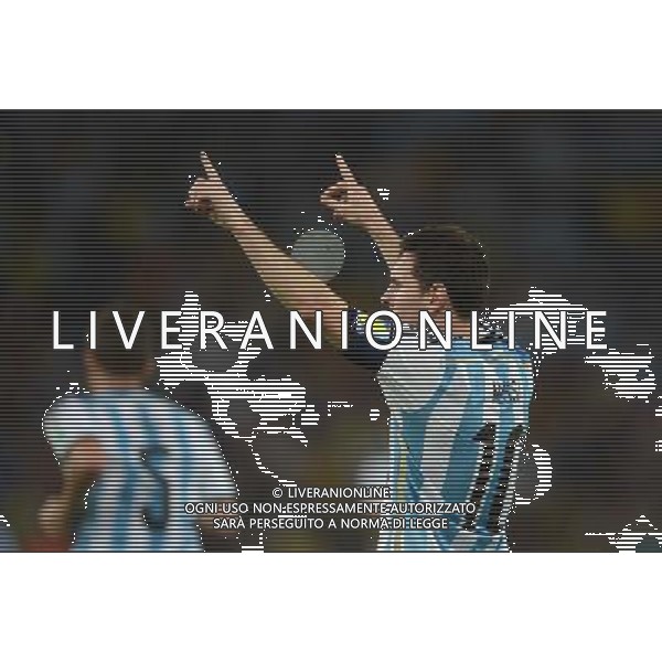 (140615) -- RIO DE JANEIRO, June 15, 2014 () -- Argentina\'s Lionel Messi (R) celebrates for his goal during a Group F match between Argentina and Bosnia and Herzegovina of 2014 FIFA World Cup at the Estadio de Maracana Stadium in Rio de Janeiro, Brazil, June 15, 2014. (/Wang Yuguo)(pcy) ©photoshot/Agenzia Aldo Liverani sas - ITALY ONLY - Argentina - Bosnia Erzegovina partita del Gruppo F Coppa del Mondo 2014 FIFA World Cup allo Stadio Maracana\' Stadium di Rio de Janeiro, in Brasile, 15 giugno 2014