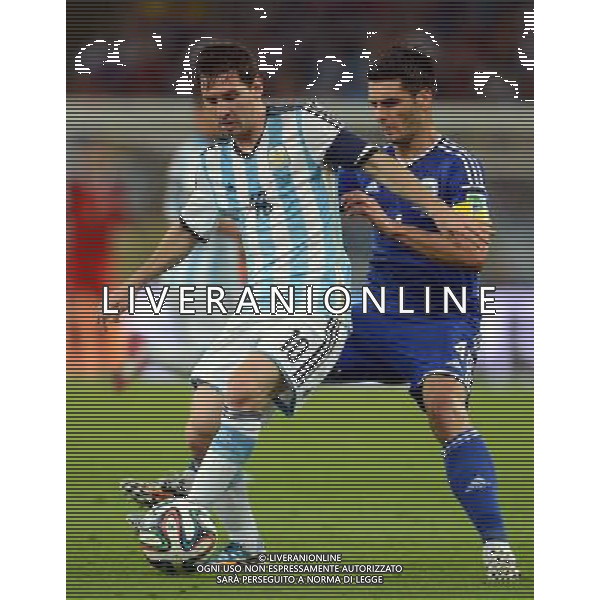(140615) -- RIO DE JANEIRO, June 15, 2014 () -- Argentina\'s Lionel Messi (L) vies with Bosnia and Herzegovina\'s Emir Spahic during a Group F match between Argentina and Bosnia and Herzegovina of 2014 FIFA World Cup at the Estadio de Maracana Stadium in Rio de Janeiro, Brazil, June 15, 2014. (/Wang Yuguo)(pcy) ©photoshot/Agenzia Aldo Liverani sas - ITALY ONLY - Argentina - Bosnia Erzegovina partita del Gruppo F Coppa del Mondo 2014 FIFA World Cup allo Stadio Maracana\' Stadium di Rio de Janeiro, in Brasile, 15 giugno 2014