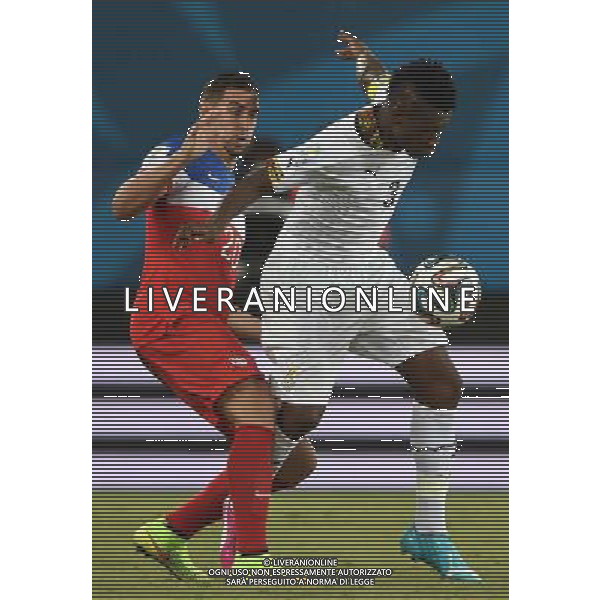 (140616) -- NATAL, June 16, 2014 () -- Ghana\'s Asamoah Gyan vies with Geoff Cameron of U.S. during a Group G match between Ghana and U.S. of 2014 FIFA World Cup at the Estadio das Dunas Stadium in Natal, Brazil, June 16, 2014. (/Guo Yong)(rh) AG ALDO LIVERANI SAS ONLY ITALY