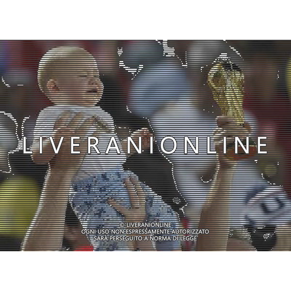 (140616) -- NATAL, June 16, 2014 () -- A baby held by fans of U.S. reacts during a Group G match between Ghana and U.S. of 2014 FIFA World Cup at the Estadio das Dunas Stadium in Natal, Brazil, June 16, 2014. (/Lui Siu Wai)(pcy) AG ALDO LIVERANI SAS ONLY ITALY
