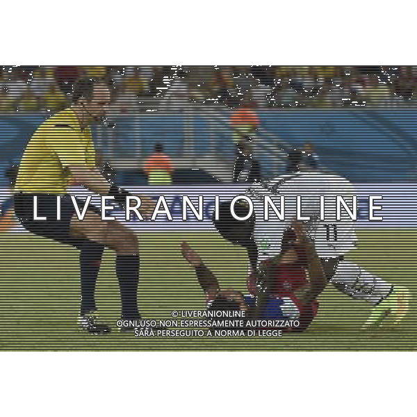 (140616) -- NATAL, June 16, 2014 () -- Ghana\'s Sulley Muntari conflicts with Jermaine Jones of U.S. during a Group G match between Ghana and U.S. of 2014 FIFA World Cup at the Estadio das Dunas Stadium in Natal, Brazil, June 16, 2014. (/Lui Siu Wai)(pcy) AG ALDO LIVERANI SAS ONLY ITALY