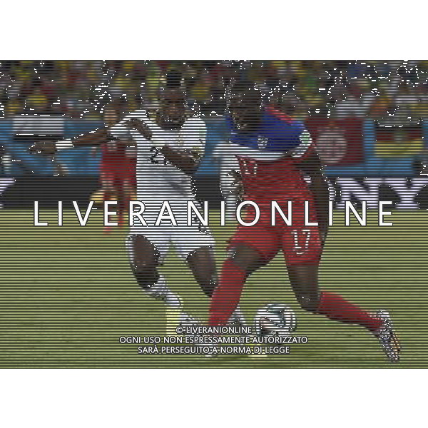 (140616) -- NATAL, June 16, 2014 () -- Jozy Altidore (R) of U.S. gets injured in a competition with Ghana\'s John Boye during a Group G match between Ghana and U.S. of 2014 FIFA World Cup at the Estadio das Dunas Stadium in Natal, Brazil, June 16, 2014. (/Lui Siu Wai)(pcy) AG ALDO LIVERANI SAS ONLY ITALY