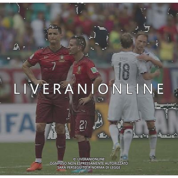 (140616) -- SALVADOR, June 16, 2014 () -- Portugal\'s Cristiano Ronaldo (1st L) and Joao Pereira (2nd L) react after a Group G match between Germany and Portugal of 2014 FIFA World Cup at the Arena Fonte Nova Stadium in Salvador, Brazil, June 16, 2014. Germany won 4-0 over Portugal on Monday.(/Yang Lei)(rh) AG ALDO LIVERANI SAS ONLY ITALY