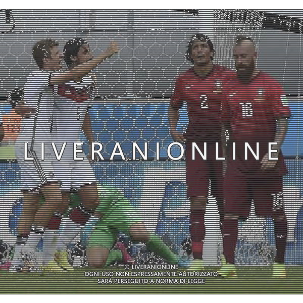 (140616) -- SALVADOR, June 16, 2014 () -- Germany\'s Thomas Muller (1st L) celebrates the goal during a Group G match between Germany and Portugal of 2014 FIFA World Cup at the Arena Fonte Nova Stadium in Salvador, Brazil, June 16, 2014. Germany won 4-0 over Portugal on Monday.(/Qi Heng)(rh) AG ALDO LIVERANI SAS ONLY ITALY