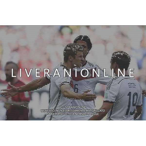 (140616) -- SALVADOR, June 16, 2014 () -- Germany\'s Thomas Muller (L) celebrates the penalty score during a Group G match between Germany and Portugal of 2014 FIFA World Cup at the Arena Fonte Nova Stadium in Salvador, Brazil, June 16, 2014. Germany won 4-0 over Portugal on Monday.(/Qi Heng)(rh) AG ALDO LIVERANI SAS ONLY ITALY