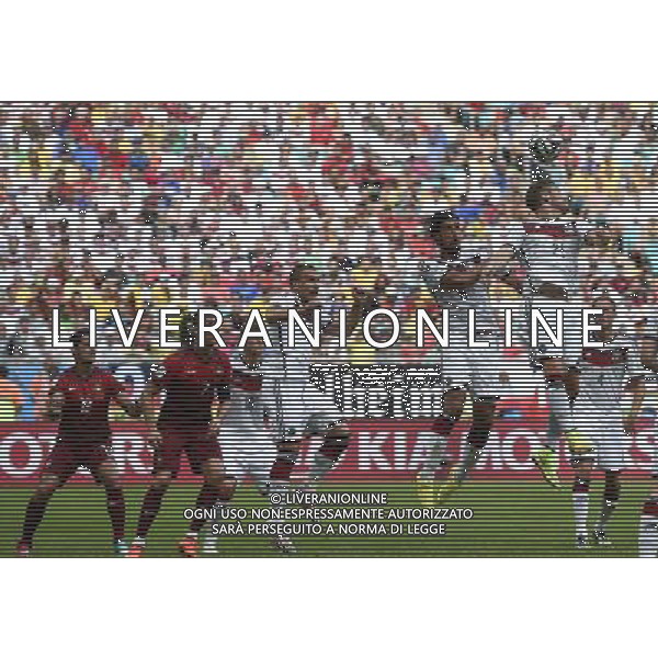 (140616) -- SALVADOR, June 16, 2014 () -- Germany\'s Shkodran Mustafi (1st R) jumps for a header during a Group G match between Germany and Portugal of 2014 FIFA World Cup at the Arena Fonte Nova Stadium in Salvador, Brazil, June 16, 2014. Germany won 4-0 over Portugal on Monday.(/Qi Heng)(rh) AG ALDO LIVERANI SAS ONLY ITALY