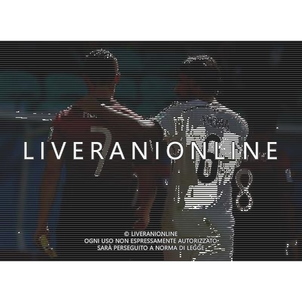 (140616) -- SALVADOR, June 16, 2014 () -- Germany\'s Sami Khedira talks with Portugal\'s Cristiano Ronaldo at the end of a Group G match between Germany and Portugal of 2014 FIFA World Cup at the Arena Fonte Nova Stadium in Salvador, Brazil, June 16, 2014. Germany won 4-0 over Portugal on Monday.(/Cao Can)(rh) AG ALDO LIVERANI SAS ONLY ITALY