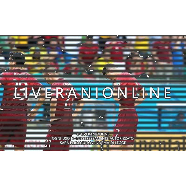 (140616) -- SALVADOR, June 16, 2014 () -- Portugal\'s Cristiano Ronaldo (R) reacts at the end of a Group G match between Germany and Portugal of 2014 FIFA World Cup at the Arena Fonte Nova Stadium in Salvador, Brazil, June 16, 2014. Germany won 4-0 over Portugal on Monday.(/Cao Can)(rh) AG ALDO LIVERANI SAS ONLY ITALY