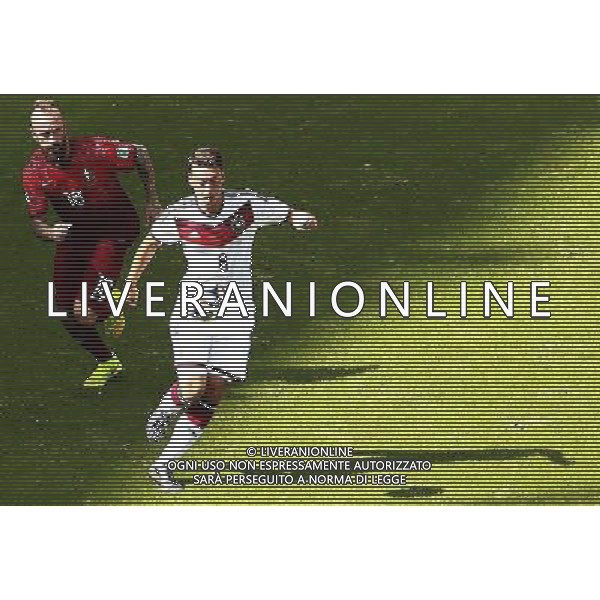 (140616) -- SALVADOR, June 16, 2014 () -- Germany\'s Mesut Ozil vies with Portugal\'s Raul Meireles during a Group G match between Germany and Portugal of 2014 FIFA World Cup at the Arena Fonte Nova Stadium in Salvador, Brazil, June 16, 2014. Germany won 4-0 over Portugal on Monday.(/Liu Bin)(rh) AG ALDO LIVERANI SAS ONLY ITALY