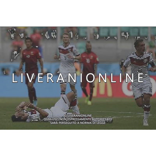(140616) -- SALVADOR, June 16, 2014 () -- Germany\'s Mats Hummels falls down on the field during a Group G match between Germany and Portugal of 2014 FIFA World Cup at the Arena Fonte Nova Stadium in Salvador, Brazil, June 16, 2014. Germany won 4-0 over Portugal on Monday.(/Qi Heng)(rh) AG ALDO LIVERANI SAS ONLY ITALY