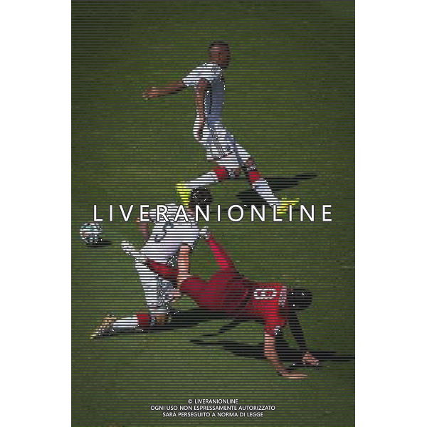 (140616) -- SALVADOR, June 16, 2014 () -- Portugal\'s Joao Moutinho falls down as he fights for the ball with Germany\'s Mats Hummels and Jerome Boateng during a Group G match between Germany and Portugal of 2014 FIFA World Cup at the Arena Fonte Nova Stadium in Salvador, Brazil, June 16, 2014. Germany won 4-0 over Portugal on Monday.(/Liu Bin)(rh) AG ALDO LIVERANI SAS ONLY ITALY