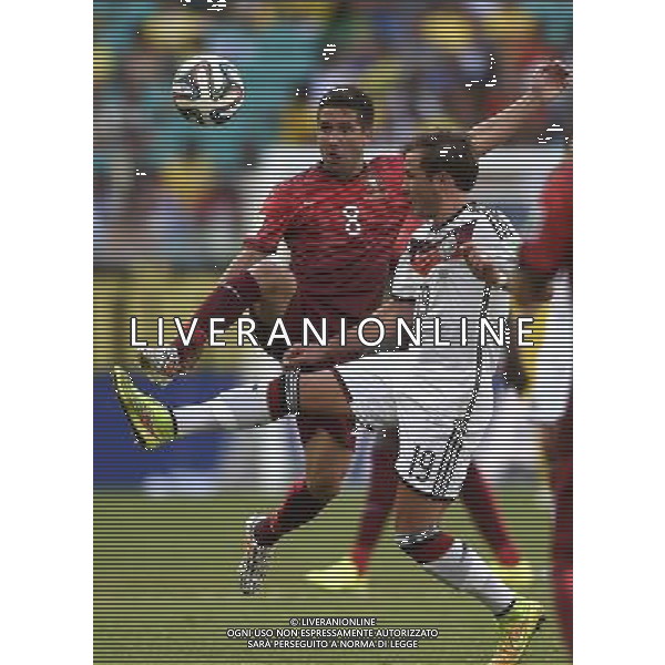(140616) -- SALVADOR, June 16, 2014 () -- Germany\'s Mario Gotze (R) vies with Portugal\'s Joao Moutinho during a Group G match between Germany and Portugal of 2014 FIFA World Cup at the Arena Fonte Nova Stadium in Salvador, Brazil, June 16, 2014. (/Yang Lei)(xzj) AG ALDO LIVERANI SAS ONLY ITALY