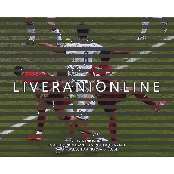 (140616) -- SALVADOR, June 16, 2014 () -- Germany\'s Thomas Muller (C) vies with Portugal\'s Ricardo Costa (R) and Cristiano Ronaldo (L) during a Group G match between Germany and Portugal of 2014 FIFA World Cup at the Arena Fonte Nova Stadium in Salvador, Brazil, June 16, 2014. (/Liu Bin)(rh) AG ALDO LIVERANI SAS ONLY ITALY
