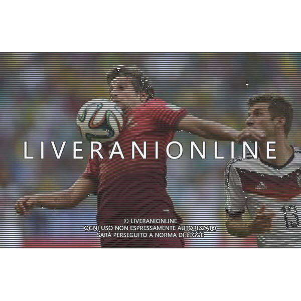 (140616) -- SALVADOR, June 16, 2014 () -- Portugal\'s Fabio Coentreo competes with Germany\'s Thomas Mueller during a Group G match between Germany and Portugal of 2014 FIFA World Cup at the Arena Fonte Nova Stadium in Salvador, Brazil, June 16, 2014. (/Yang Lei)(xzj) AG ALDO LIVERANI SAS ONLY ITALY