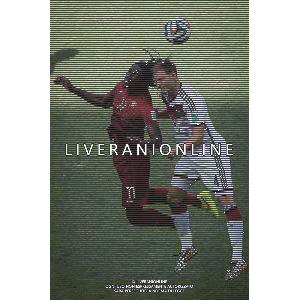 (140616) -- SALVADOR, June 16, 2014 () -- Germany\'s Benedikt Howedes cpmpetes for a header with Portugal\'s Eder during a Group G match between Germany and Portugal of 2014 FIFA World Cup at the Arena Fonte Nova Stadium in Salvador, Brazil, June 16, 2014. (/Liu Bin)(rh) AG ALDO LIVERANI SAS ONLY ITALY