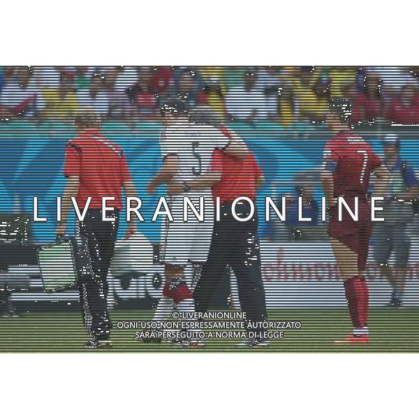 (140616) -- SALVADOR, June 16, 2014 () -- Germany\'s Mats Hummels (C) leaves the field during a Group G match between Germany and Portugal of 2014 FIFA World Cup at the Arena Fonte Nova Stadium in Salvador, Brazil, June 16, 2014. (/Cao Can)(rh) AG ALDO LIVERANI SAS ONLY ITALY