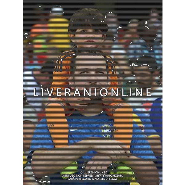 (140616) -- SALVADOR, June 16, 2014 () -- A father and his son look on prior to a Group G match between Germany and Portugal of 2014 FIFA World Cup at the Arena Fonte Nova Stadium in Salvador, Brazil, June 16, 2014. (/Yang Lei)(xzj) AG ALDO LIVERANI SAS ONLY ITALY