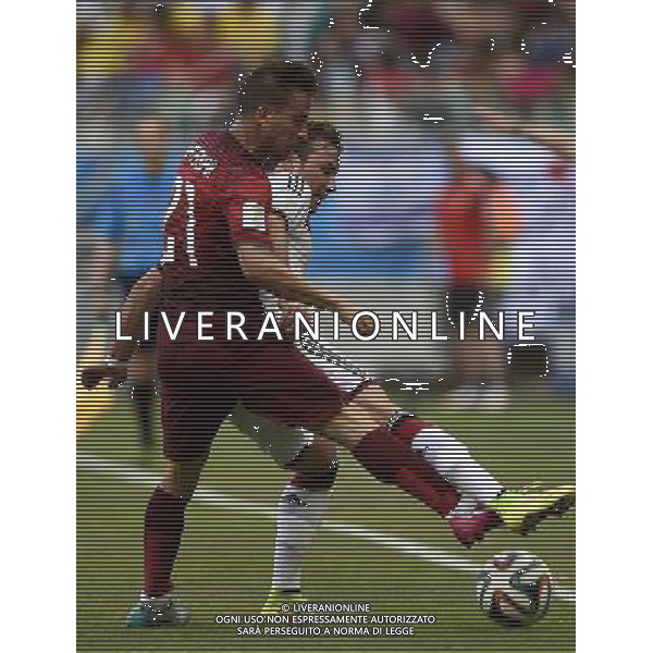 (140616) -- SALVADOR, June 16, 2014 () -- Portugal\'s Joao Pereira (L) vies with Germany\'s Mario Gotze during a Group G match between Germany and Portugal of 2014 FIFA World Cup at the Arena Fonte Nova Stadium in Salvador, Brazil, June 16, 2014. (/Qi Heng)(pcy) AG ALDO LIVERANI SAS ONLY ITALY