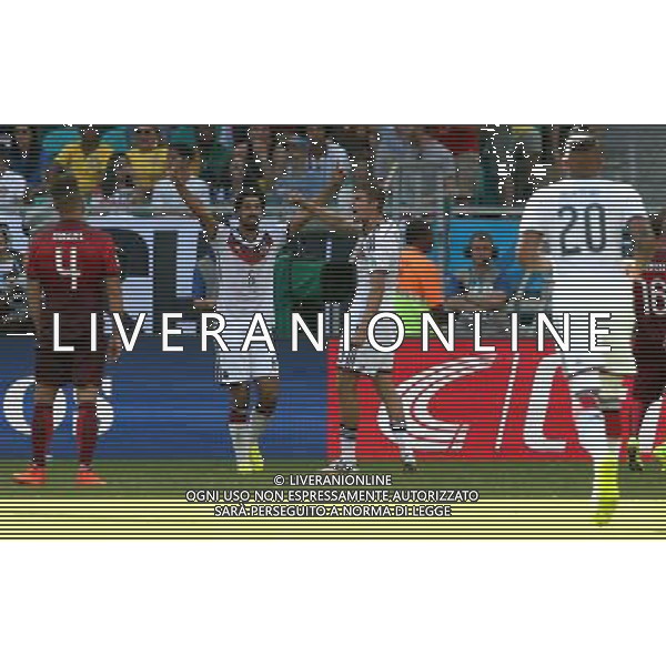 (140616) -- SALVADOR, June 16, 2014 () -- Germany\'s Thomas Muller (3rd L) celebrates for his second goal during a Group G match between Germany and Portugal of 2014 FIFA World Cup at the Arena Fonte Nova Stadium in Salvador, Brazil, June 16, 2014. (/Cao Can)(pcy) AG ALDO LIVERANI SAS ONLY ITALY