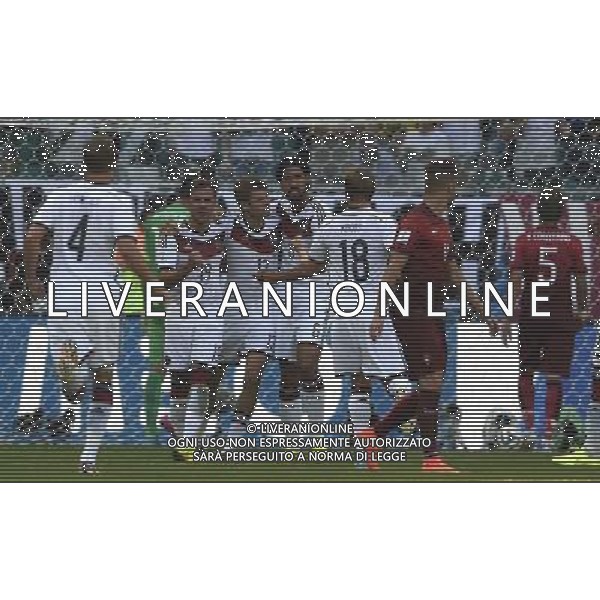 (140616) -- SALVADOR, June 16, 2014 () -- Germany\'s Thomas Muller (3rd L) celebrates with teammate after a penalty goal during a Group G match between Germany and Portugal of 2014 FIFA World Cup at the Arena Fonte Nova Stadium in Salvador, Brazil, June 16, 2014. (/Yang Lei)(xzj) AG ALDO LIVERANI SAS ONLY ITALY
