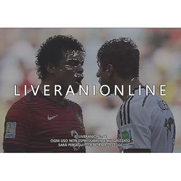 (140616) -- SALVADOR, June 16, 2014 () -- Germany\'s Thomas Muller (R) argues with Portugal\'s Pepe who fouls during a Group G match between Germany and Portugal of 2014 FIFA World Cup at the Arena Fonte Nova Stadium in Salvador, Brazil, June 16, 2014. (/Qi Heng)(pcy) AG ALDO LIVERANI SAS ONLY ITALY