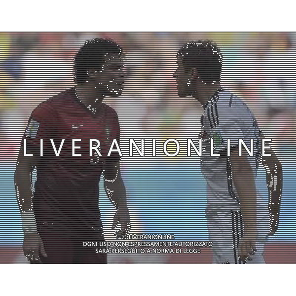 (140616) -- SALVADOR, June 16, 2014 () -- Germany\'s Thomas Muller (R) argues with Portugal\'s Pepe who fouls during a Group G match between Germany and Portugal of 2014 FIFA World Cup at the Arena Fonte Nova Stadium in Salvador, Brazil, June 16, 2014. (/Qi Heng)(pcy) AG ALDO LIVERANI SAS ONLY ITALY