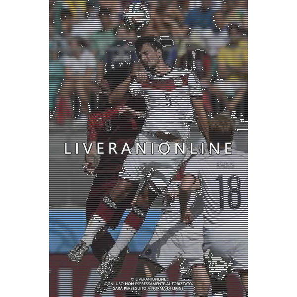 (140616) -- SALVADOR, June 16, 2014 () -- Germany\'s Mats Hummels (2nd L) competes for a header with Portugal\'s Hugo Almeida (1st L) during a Group G match between Germany and Portugal of 2014 FIFA World Cup at the Arena Fonte Nova Stadium in Salvador, Brazil, June 16, 2014. (/Qi Heng)(pcy) AG ALDO LIVERANI SAS ONLY ITALY