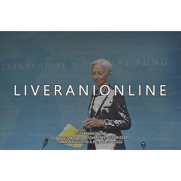 (140616) -- WASHINGTON D.C., June 16, 2014 () -- International Monetary Fund(IMF) Managing Director Christine Lagarde(R) attends a press conference at the IMF headquarters in Washington D.C., the United States, on June 16, 2014. The International Monetary Fund on Monday sharply lowered its U.S. economic growth forecasts for this year from the perviously predicted 2.8 percent to 2 percent due to a weak first quarter. (/Yin Bogu) AG ALDO LIVERANI SAS ONLY ITALY