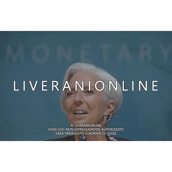 (140616) -- WASHINGTON D.C., June 16, 2014 () -- International Monetary Fund(IMF) Managing Director Christine Lagarde(R) speaks during a press conference at the IMF headquarters in Washington D.C., the United States, on June 16, 2014. The International Monetary Fund on Monday sharply lowered its U.S. economic growth forecasts for this year from the perviously predicted 2.8 percent to 2 percent due to a weak first quarter. (/Yin Bogu) AG ALDO LIVERANI SAS ONLY ITALY