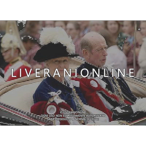 WINDSOR, ENGLAND - JUNE 16: Princess Alexandra and Prince Edward, Duke of Kent travel by carriage after the Most Noble Order of the Garter Ceremony on June 16, 2014 in Windsor, England. The Order of the Garter is the senior and oldest British Order of Chivalry, founded by Edward III in 1348. Membership in the order is limited to the sovereign, the Prince of Wales, and no more than twenty-four members. ©PHOTOSHOT/Agenzia Aldo Liverani sas - ITALY ONLY - EDITORIAL USE ONLY - REALI INGLESI: La Regina Elisabetta II d\'inghilterra e la famiglia reale in processione con i membri dell\'Ordine della Giarrettiera alla Cappella di San Giorgio. Castello di Windsor. Londra
