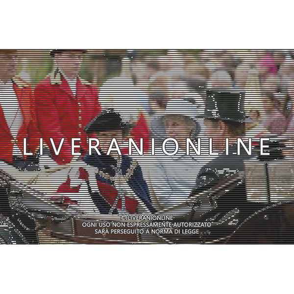 WINDSOR, ENGLAND - JUNE 16: Princess Anne, Princess Royal and Birgitte, Duchess of Gloucester travel by carriage after the Most Noble Order of the Garter Ceremony on June 16, 2014 in Windsor, England. The Order of the Garter is the senior and oldest British Order of Chivalry, founded by Edward III in 1348. Membership in the order is limited to the sovereign, the Prince of Wales, and no more than twenty-four members. ©PHOTOSHOT/Agenzia Aldo Liverani sas - ITALY ONLY - EDITORIAL USE ONLY - REALI INGLESI: La Regina Elisabetta II d\'inghilterra e la famiglia reale in processione con i membri dell\'Ordine della Giarrettiera alla Cappella di San Giorgio. Castello di Windsor. Londra