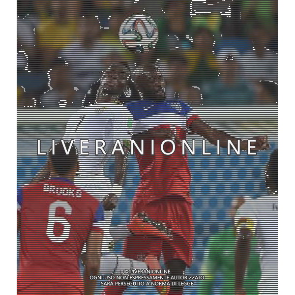 (140616) -- NATAL, June 16, 2014 () -- Ghana\'s Christian Atsu competes for a header with DaMarcus Beasley of U.S. during a Group G match between Ghana and U.S. of 2014 FIFA World Cup at the Estadio das Dunas Stadium in Natal, Brazil, June 16, 2014. (/Guo Yong)(rh) AG ALDO LIVERANI SAS ONLY ITALY