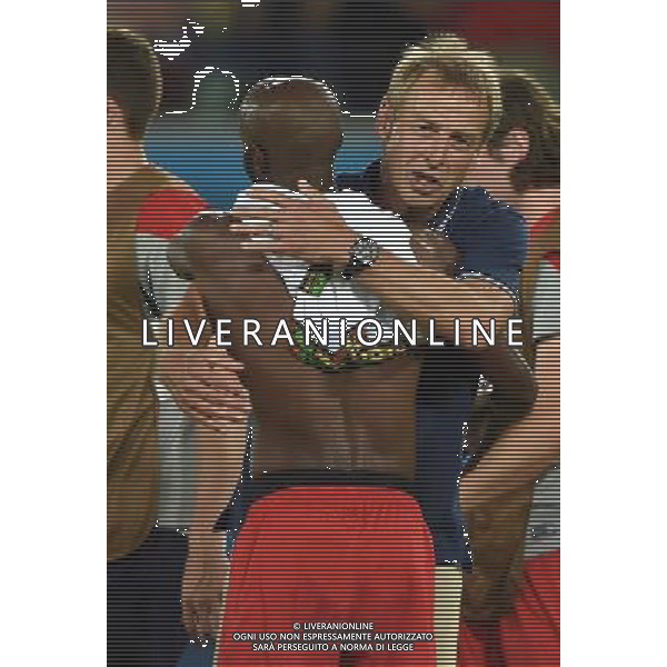 (140616) -- NATAL, June 16, 2014 () -- Coach of U.S. Jurgen Klinsmann embraces Damarcus Beasley celebrating for their victory after a Group G match between Ghana and U.S. of 2014 FIFA World Cup at the Estadio das Dunas Stadium in Natal, Brazil, June 16, 2014. U.S. won 2-1 over Ghana on Monday. (/Guo Yong)(pcy) AG ALDO LIVERANI SAS ONLY ITALY
