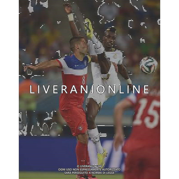 (140616) -- NATAL, June 16, 2014 () -- Ghana\'s John Boye vies with Clint Dempsey of U.S. during a Group G match between Ghana and U.S. of 2014 FIFA World Cup at the Estadio das Dunas Stadium in Natal, Brazil, June 16, 2014. (/Guo Yong)(rh) AG ALDO LIVERANI SAS ONLY ITALY