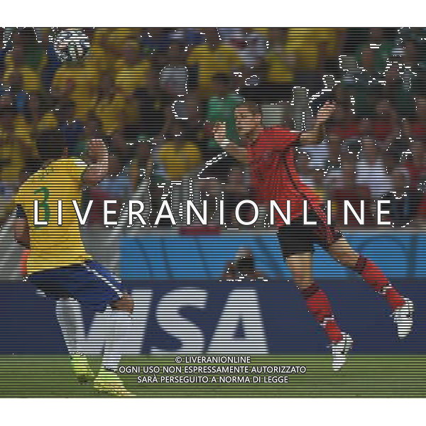 (140617) -- FORTALEZA, June 17, 2014 () -- Brazil\'s Thiago Silva (L) vies with Mexico\'s Javier Hernandez (R) during a Group A match between Brazil and Mexico of 2014 FIFA World Cup at the Estadio Castelao Stadium in Fortaleza, Brazil, June 17, 2014.The match concluded 0-0.(/Guo Yong)(rh) AG ALDO LIVERANI SAS ONLY ITALY