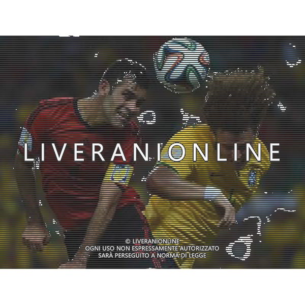 (140617) -- FORTALEZA, June 17, 2014 () -- Brazil\'s David Luiz (R) vies with Mexico\'s Rafael Marquez (L) during a Group A match between Brazil and Mexico of 2014 FIFA World Cup at the Estadio Castelao Stadium in Fortaleza, Brazil, June 17, 2014.The match concluded 0-0.(/Guo Yong)(rh) AG ALDO LIVERANI SAS ONLY ITALY