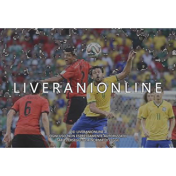 (140617) -- FORTALEZA, June 17, 2014 () -- Brazil\'s Fred (2nd R) competes for a header with Mexico\'s Francisco Rodriguez (2nd L) during a Group A match between Brazil and Mexico of 2014 FIFA World Cup at the Estadio Castelao Stadium in Fortaleza, Brazil, June 17, 2014.(/Lui Siu Wai)(xzj) AG ALDO LIVERANI SAS ONLY ITALY