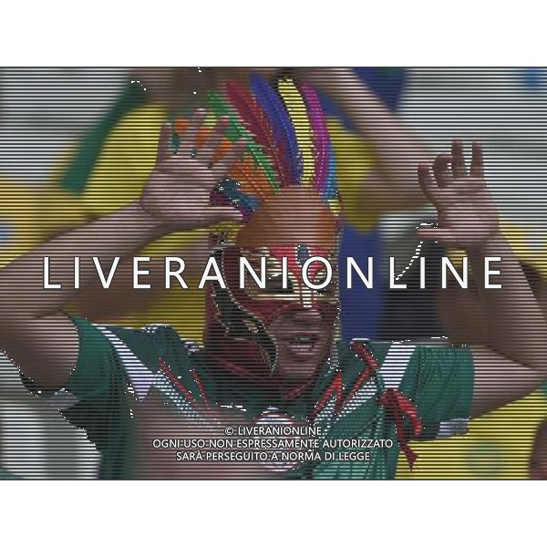 (140617) -- FORTALEZA, June 17, 2014 () -- A Mexico\'s fan poses for photo during a Group A match between Brazil and Mexico of 2014 FIFA World Cup at the Estadio Castelao Stadium in Fortaleza, Brazil, June 17, 2014.(/Guo Yong)(rh) AG ALDO LIVERANI SAS ONLY ITALY