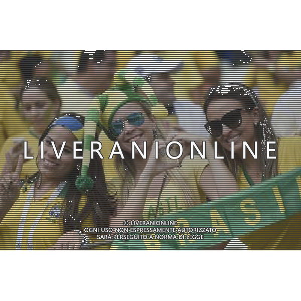 (140617) -- FORTALEZA, June 17, 2014 () -- Fans of team Brazil cheer prior to a Group A match between Brazil and Mexico of 2014 FIFA World Cup at the Estadio Castelao Stadium in Fortaleza, Brazil, June 17, 2014.(/Lui Siu Wai)(xzj) AG ALDO LIVERANI SAS ONLY ITALY