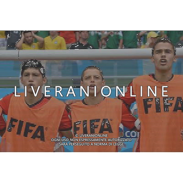 (140617) -- FORTALEZA, June 17, 2014 () -- Mexico\'s players sing Mexican national anthem during a Group A match between Brazil and Mexico of 2014 FIFA World Cup at the Estadio Castelao Stadium in Fortaleza, Brazil, June 17, 2014.(/Guo Yong)(rh) AG ALDO LIVERANI SAS ONLY ITALY