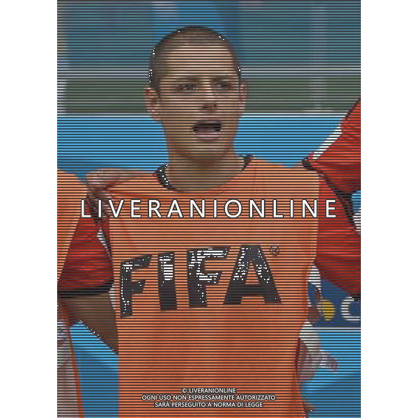 (140617) -- FORTALEZA, June 17, 2014 () -- Mexico\'s Javier Hernandez sings Mexican national anthem during a Group A match between Brazil and Mexico of 2014 FIFA World Cup at the Estadio Castelao Stadium in Fortaleza, Brazil, June 17, 2014.(/Guo Yong)(rh) AG ALDO LIVERANI SAS ONLY ITALY