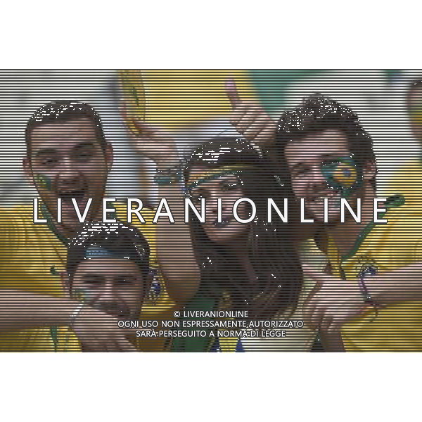 (140617) -- FORTALEZA, June 17, 2014 () -- Fans of team Brazil cheer prior to a Group A match between Brazil and Mexico of 2014 FIFA World Cup at the Estadio Castelao Stadium in Fortaleza, Brazil, June 17, 2014.(/Lui Siu Wai)(xzj) AG ALDO LIVERANI SAS ONLY ITALY