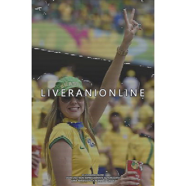 (140617) -- FORTALEZA, June 17, 2014 () -- A fan of team Brazil cheers prior to a Group A match between Brazil and Mexico of 2014 FIFA World Cup at the Estadio Castelao Stadium in Fortaleza, Brazil, June 17, 2014.(/Lui Siu Wai)(xzj) AG ALDO LIVERANI SAS ONLY ITALY