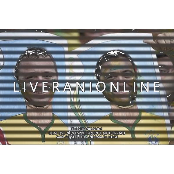 (140617) -- FORTALEZA, June 17, 2014 () -- Fans of team Brazil cheer prior to a Group A match between Brazil and Mexico of 2014 FIFA World Cup at the Estadio Castelao Stadium in Fortaleza, Brazil, June 17, 2014.(/Lui Siu Wai)(xzj) AG ALDO LIVERANI SAS ONLY ITALY