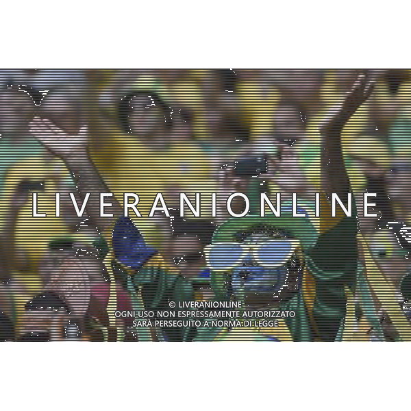 (140617) -- FORTALEZA, June 17, 2014 () -- A fan of team Brazil cheers prior to a Group A match between Brazil and Mexico of 2014 FIFA World Cup at the Estadio Castelao Stadium in Fortaleza, Brazil, June 17, 2014.(/Lui Siu Wai)(xzj) AG ALDO LIVERANI SAS ONLY ITALY