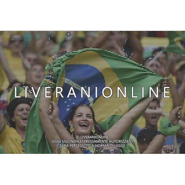 (140617) -- FORTALEZA, June 17, 2014 () -- Fans of team Brazil cheer prior to a Group A match between Brazil and Mexico of 2014 FIFA World Cup at the Estadio Castelao Stadium in Fortaleza, Brazil, June 17, 2014.(/Lui Siu Wai)(xzj) AG ALDO LIVERANI SAS ONLY ITALY
